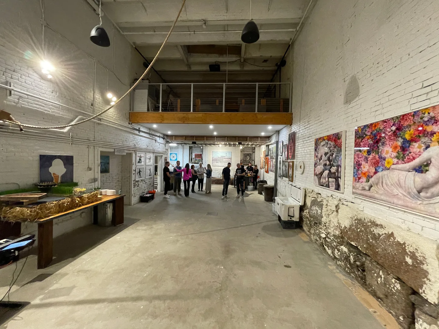 The open art-lined loft at Boston Button Factory