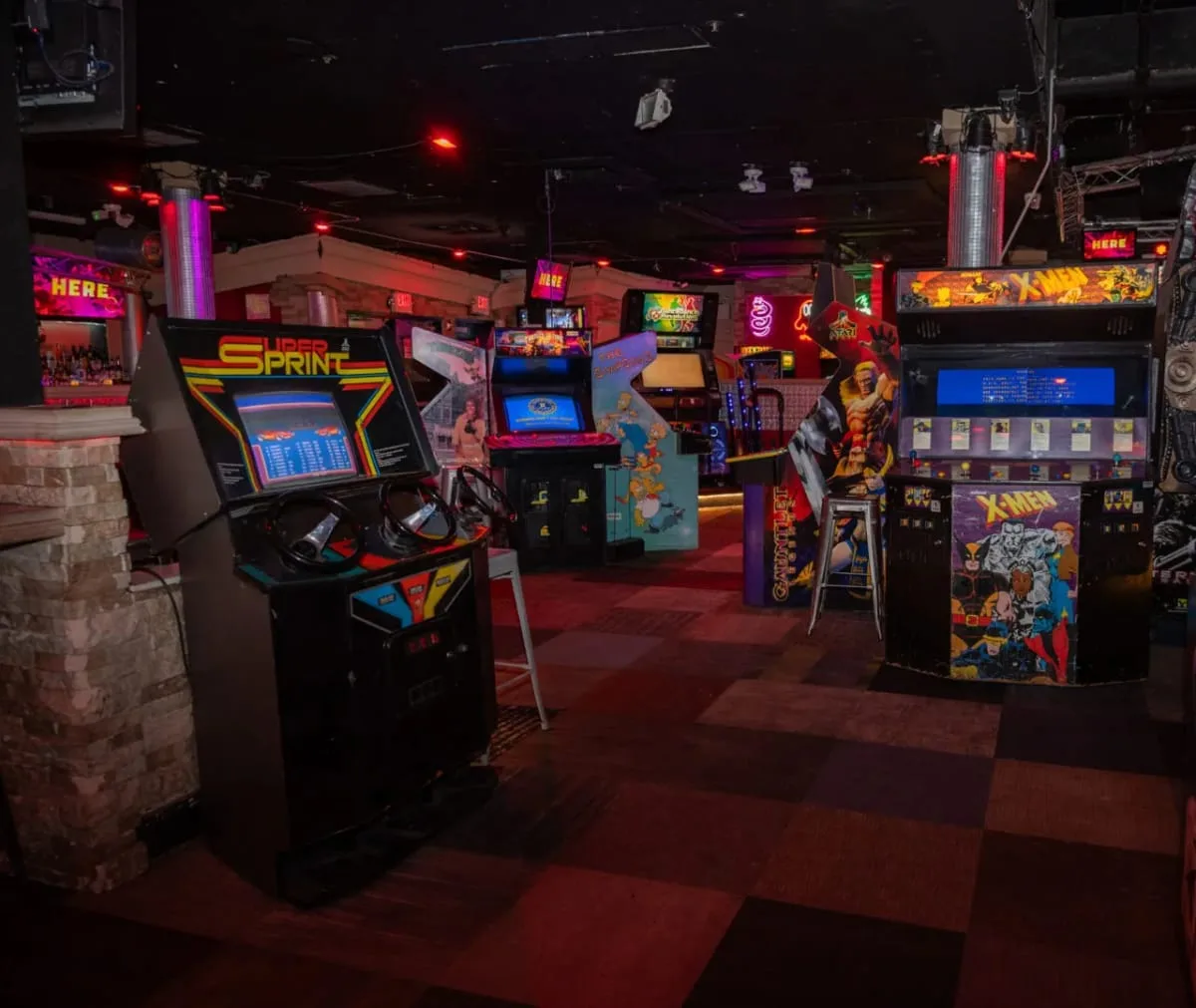 Colorful arcade games inside Freeplay Bar Arcade Providence