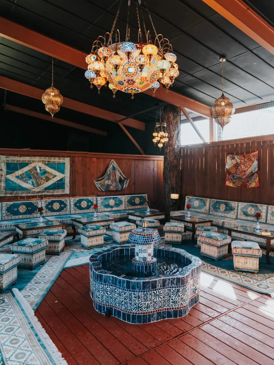 Lounge seating and patterned décor inside SipHaus in Austin