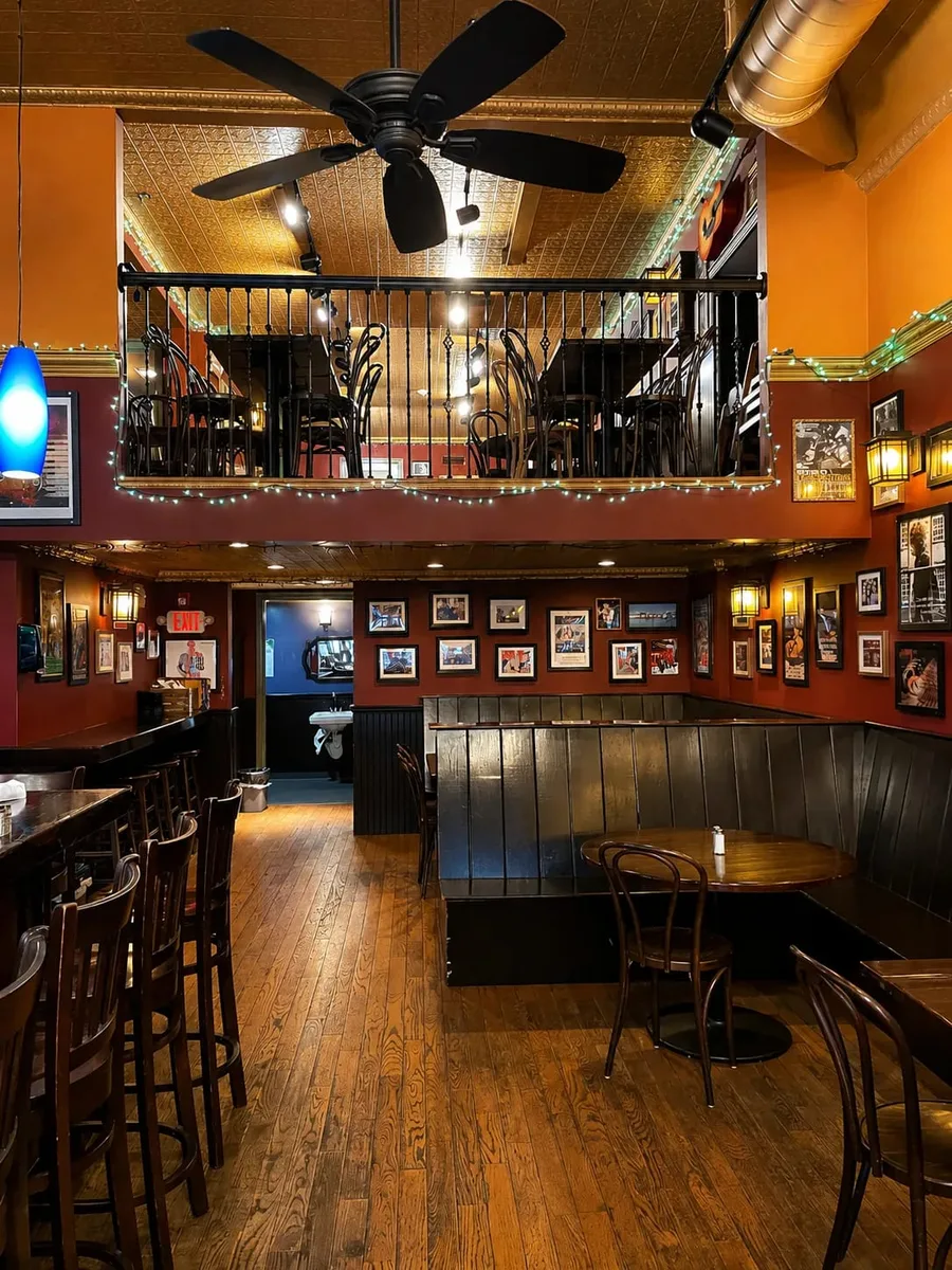 The wood-floored bar and music room at The Bebop in Boston